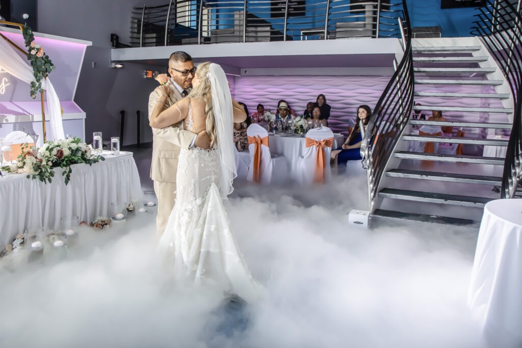 bride and grooms first dance with dancing on a cloud
