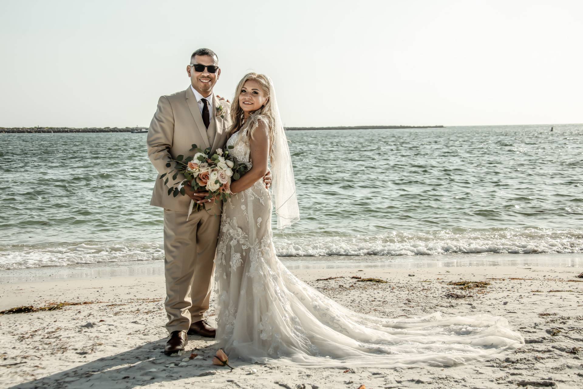 bride and groom on the beach
