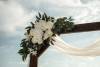 flowers on wedding arch