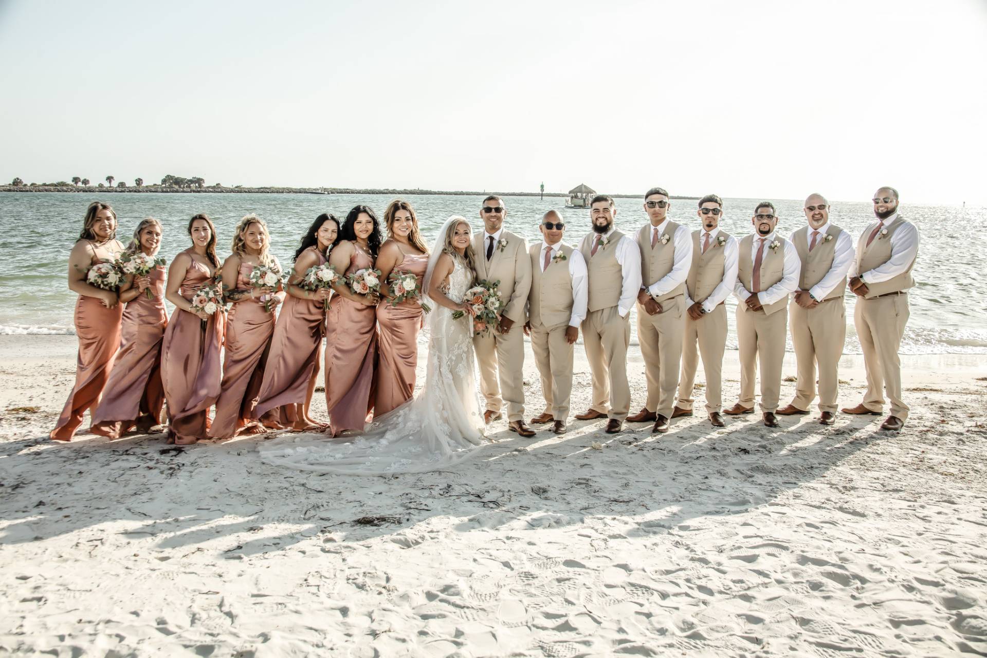 bridal party on the beach